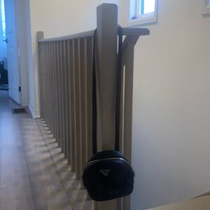 Guess cross body purse that also turns into a backpack